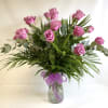 18 Lavender Roses beautifully arranged in a vase. PREMIUM includes higher end