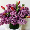 Lilac and tulips arrange by Jane"s Roses Floral Design Studio in San