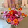 Lively and bright Holiday arrangement of gorgeous warm and vivid colors of