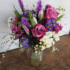 Beautiful varieties of roses, tulips and mixed farm fresh flowers. 

Medium-Tall arrangement