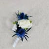 This boutonni&egrave;re is perfect for the man who wants some color added