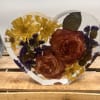 Keep your flowers in this preserved resin heart.   Flowers will