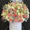 A bright and cheerful arrangement of pink and multicolored blooms, inspired by
