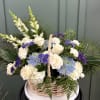 A beautiful basket arrangement designed to bring comfort and peace during difficult