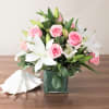 A truly gorgeous piece featuring stunning stargazer lilies and a dozen premium