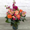 Peach Harvest is A Ladybug Floral exclusive bouquet. This bouquet stock roses