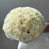 Pearl Blanc is a refined bouquet of pristine white roses, carefully arranged