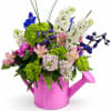 Brighten any space with this delightful floral arrangement designed in a vibrant