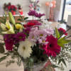 
A vibrant mix of fresh blooms designed to brighten any day. This