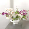 Elevate any space with this luxury orchid and hydrangea floral arrangement, expertly