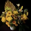 Cheery Explosion is a fine handcrafted arrangement designed  with your loved
