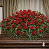 The Majestic Casket Spray from FloralFabulous is a bold and deeply meaningful
