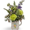 Bunny Blooms is a sweet spring arrangement tucked into an adorable keepsake