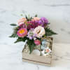 Our Farm + Sea Care Package includes a petite vase of flowers