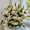Express heartfelt condolences and deep sympathy with this stunning white and blush