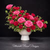 A striking composition of premium garden roses in rich crimson and vibrant