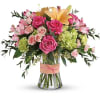 Go ahead, make them blush! This luxurious bouquet of roses, lilies and