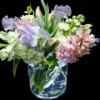 Soft pink hyacinths and airy lavender blooms combine with creamy white stock