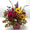 A cheerful, garden - inspired arrangement bursting with color and charm artfully