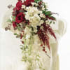 A grand mix of beautiful flowers. Mix of roses, gardenias, orchids, amaranthus