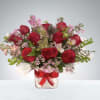 Surprise them with this stunning red rose arrangement a gesture that will