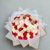 This stunning mix bouquet of white, red, and pink roses with a