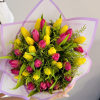 This stunning tulip bouquet features a vibrant array of tulips in various