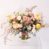A luxury Cafe Latte Garden rose arrangement with butterfly ranunculus, Anemone, poppies