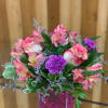 Short vase with roses, daisies and miniature carnations. Designed at Haehn Florist