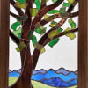 A vertical stained-glass panel that reads like a quiet summer morning -