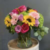 Our Spring Sensation arrangement is a beautiful array of hydrangea, roses, sunflowers