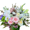 Green hydrangea, purple lisianthus, light pink spray roses, white roses, white cymbidium