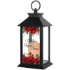 A black lantern framed in a classic rectangular silhouette offers a comforting