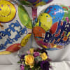 Bright, cheerful yellow roses set the tone for this birthday flower arrangement