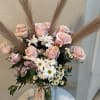 Elegant boho-style arrangement with 12 pink roses, white daisies, baby&acute;s breath and