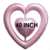Pink heart-shaped balloons with a smaller heart balloon in front