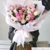 This bouquet is an extravagant display of pink and peachy roses! 

Note: