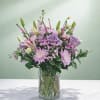 Lavender and pink bouquet in a clear glass vase