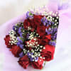 12 roses mixed with classic small blooms and wrapped and tied with