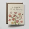 Cream greeting card with pink and peach flowers and the message 