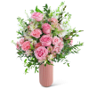 Pink roses and carnations in a tall pink vase