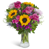 Joy in Bloom features roses, sunflowers, cremon, carnations, eryngium, dianthus, and premium