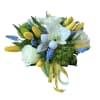 White roses, white orchids, yellow tulips, dianthus and muscari designed in a