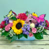 Celebrate the joy of the new season with this springtastic bouquet! Fresh