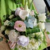 Includes Calla Lilies, Roses, Anemone, Hydrangeas, Lilies, Carnations, eucalyptus, Aspidistra,and plumosa in