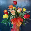 Bouquet of multicolored roses with an orange ribbon bow