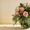 Cymbidium orchids and premium roses in soft, elegant tones-perfect for a romantic