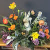 A playful spring centerpiece that brings the garden indoors-perfect as an Easter