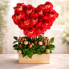 Wooden stand with roses shaped in a heart, paired with greenery and