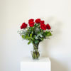 A timeless arrangement of premium long stem Ecuadorean red roses, celebrated for